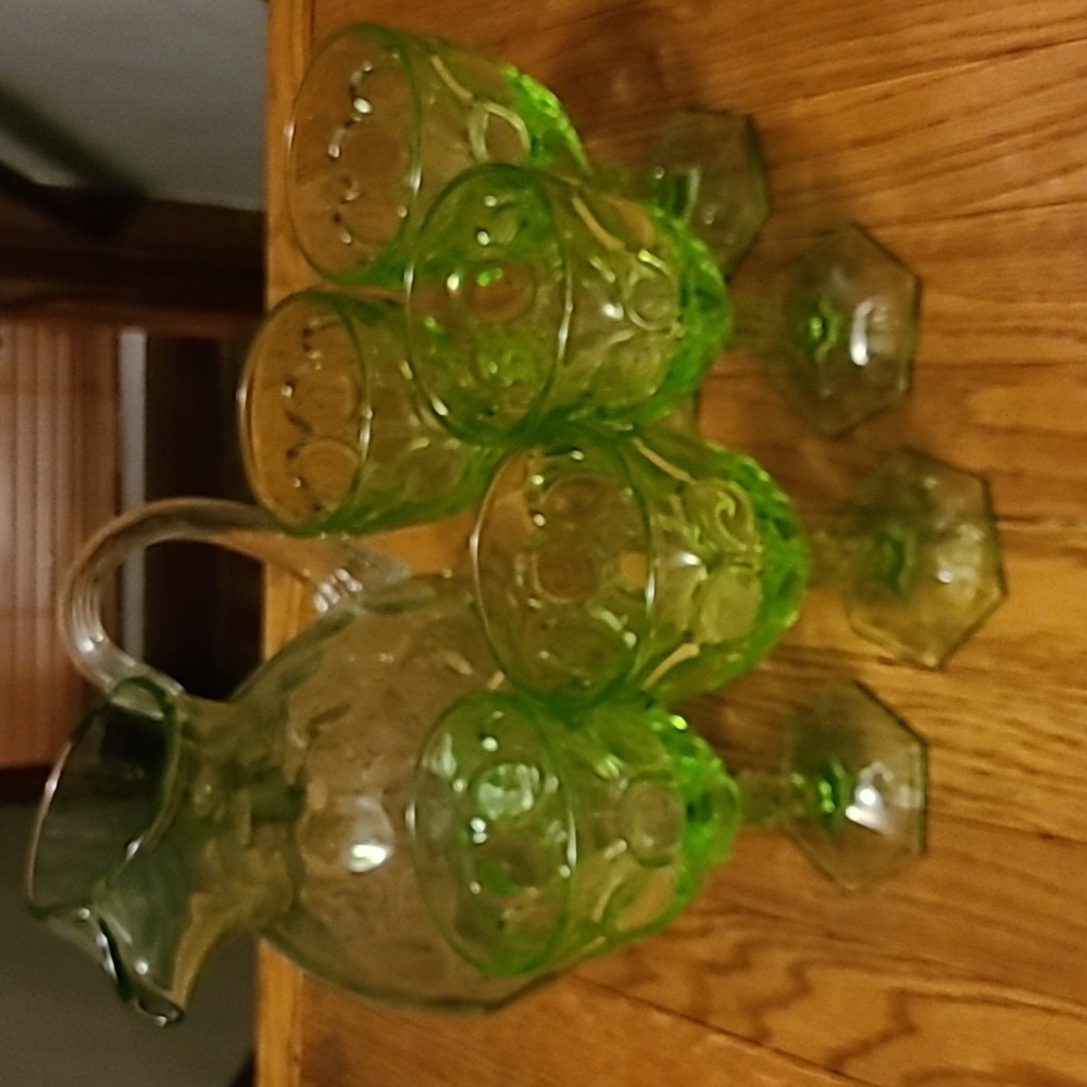 Vintage glass pitcher with 5 matching glasses.